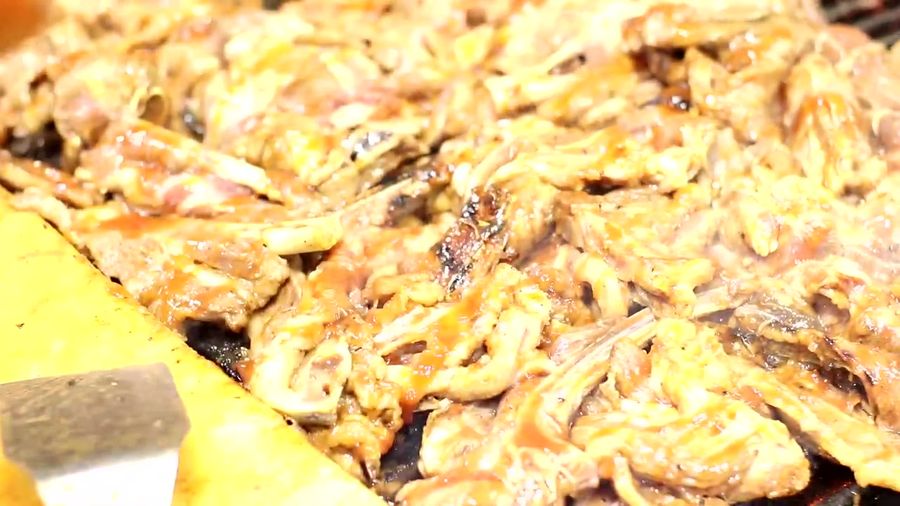 Chicken sizzling on the Tipo Grill plancha